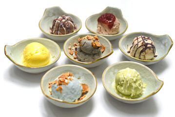 Organic ice cream in bowls on white background