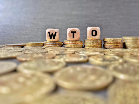 Finance Concept - WTO On Wooden Cubes. Stands For World Trade Organization. 

