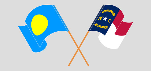 Crossed flags of Palau and The State of North Carolina. Official colors. Correct proportion