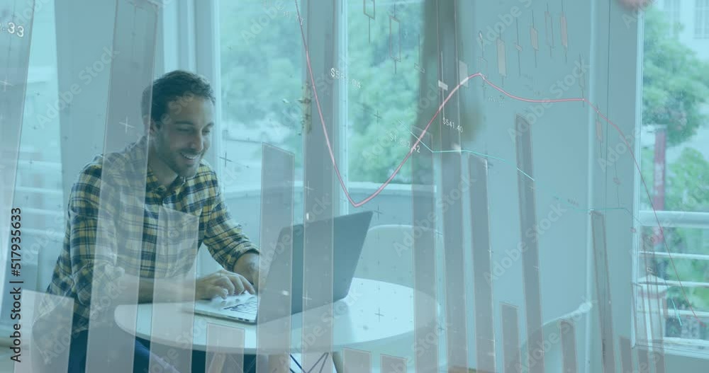 Poster animation of financial graphs and data over happy caucasian man with laptop in office