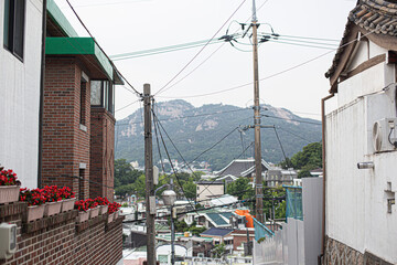 Electrical wires and roofs of typical street in Korea
