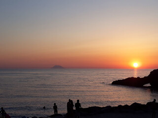 Naklejka na ściany i meble sunset on the beach, sud Italy