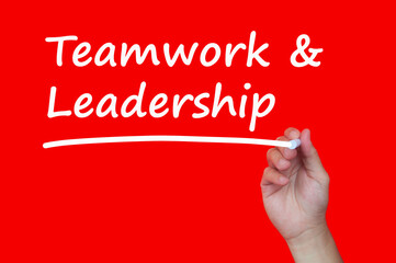 Teamwork and leadership text on red cover background.