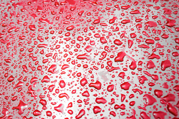 Background with small drops. Rain drops. Blood splatters. Background with colored drops. Wet surface. Paint splatters.