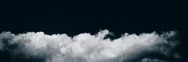 White cloud on a dark sky background.