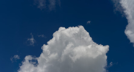 Growing white cumulus clouds.