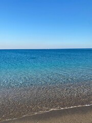 Crystal blue sea. Mediterranean Sea. Clean sea and sky. Greece. 