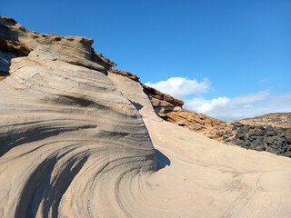 Rock formations and Lunatic and desert landscape. extreme nature. Steep volcanic sand rocks under...