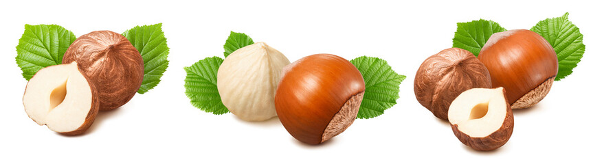 Hazelnuts with green leaves set isolated on white background