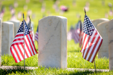 Military Headstones and Gravestones Decorated With Flags for Memorial Day