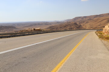 Fototapeta na wymiar Highway in the Eilat Mountains in the Southern Negev, southern Israel.