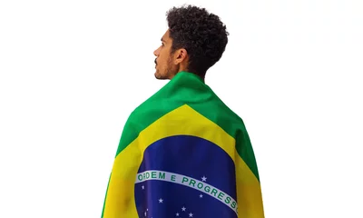 Fotobehang September seven, Brazil Independence Day. Black man holds Brazilian flag isolated. © Andre Nery