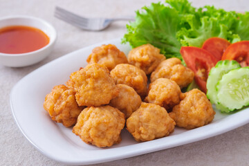 Deep fried shrimp ball and vegetable on plate