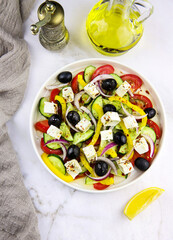 Healthy Tasty Greek Salad close-up eddited with olive oil and spices