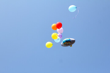 balloons in blue sky background