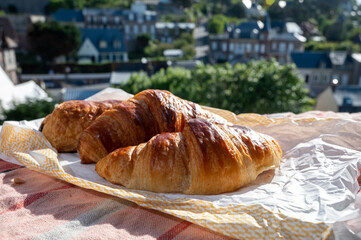 Two fresh baked butter croissants from French bakery