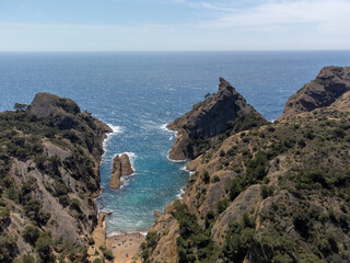 Fototapeta na wymiar Rocher du capucin cliff in blue Calanque de Figuerolles near La Ciotat, Provence, France