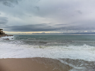 Panoramic aerial view on cliffs, beach, houses, streets and old fisherman's harbour with lighthouse in Cassis, Provence, France