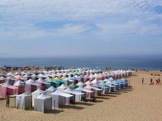 Colorful Nazare beach in the summer time, Centro - Portugal 
