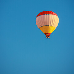 lonely hot air balloon flies