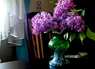 bright bouquet of lilacs in a vase