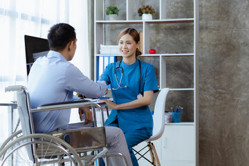 Fototapeta premium A female doctor shakes hands with a patient in a hospital examination room., treating diseases from specialists and providing targeted treatment. Concepts of medical treatment and specialists.