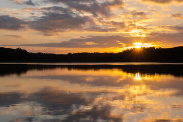 Siecino, Poland July 19, 2022. Sunrise over the lake