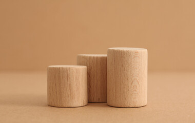 Wooden eco rustic platform podium on beige background. Minimal empty display product presentation scene.