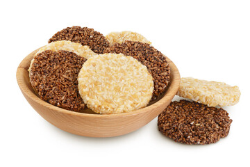 coconut and amaranth cookies with carob in wooden bowl isolated on white background with full depth of field. Healthy food.