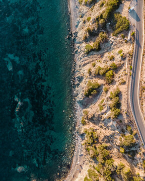 Aerial view of a road along the coast near Pomonte, Elba Island, Tuscany, Italy.