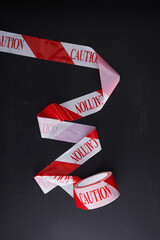 barricade tape, caution tape against chalkboard
