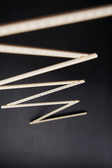 folded ruler against chalkboard