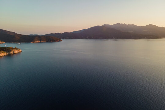 Aerial view of a beautiful bay at sunset in Capo D'Enfola, Elba Island, Tuscany, Italy.
