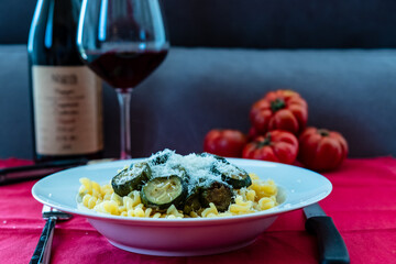 Italian food: pasta with zucchini and parmesan