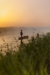 Man on the boat at river