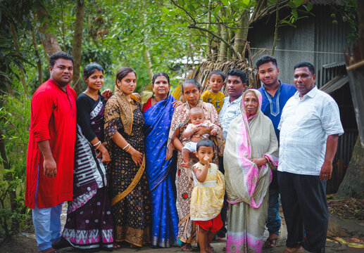 south asian family picture consists of generations of different age groups, a combined family photo 