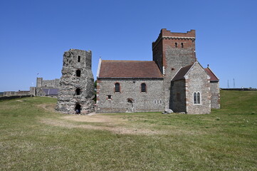Fototapeta na wymiar Christian church and an AD Roman lighthouse in Dover.