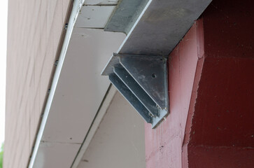 steel support structure, detail with steel beams joined by bolts to support a ladder for emergency...