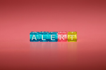 the word "alert" made up of cubes