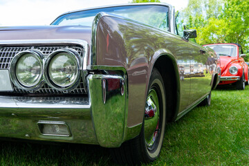 Retro car low angle view. View of the chrome bumper.