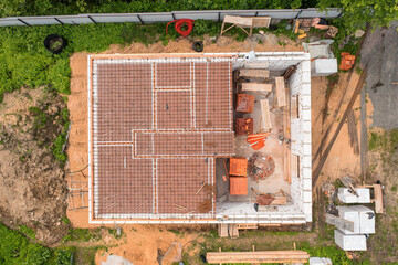 Country house under construction directly above aerial view