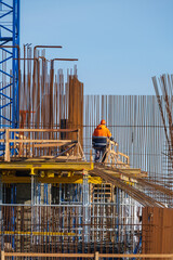 Worker on construction site on cloudless day