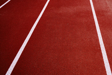 Red background with white stripes. Place in the stadium for athletics and running
