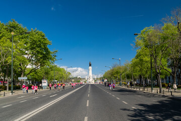 Lisboa, Portugal. April 10, 2022: Liberty avenue with blue sky.