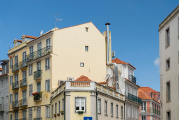 Fototapeta na wymiar Lisboa, Portugal. April 10 , 2022: Chiado neighborhood architecture at night.