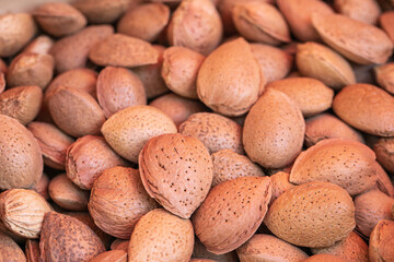  Whole almonds in shell closeup. Organic food. Organic gardening
