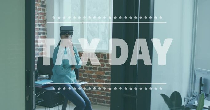 Tax day text banner against indian woman wearing vr headset at office