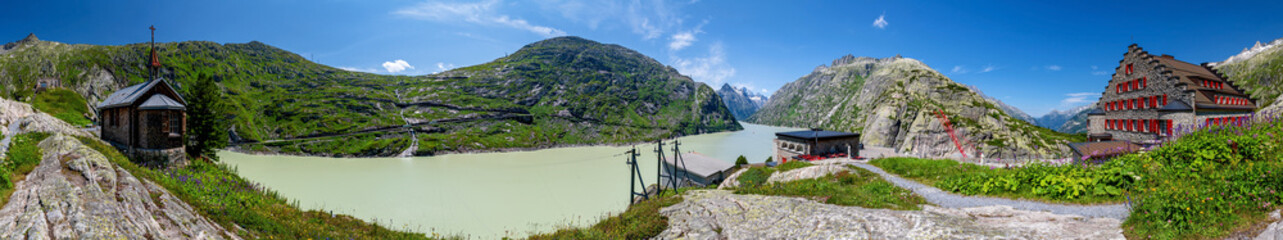 Famous Grimsel Pass crossing the Bernese Alps with Grimselsee and Grimsel Hospice in the canton of...