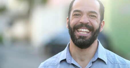 Fototapeta premium Hispanic man real life laugh and smile. Authentic person smiling and laughing, latin real people