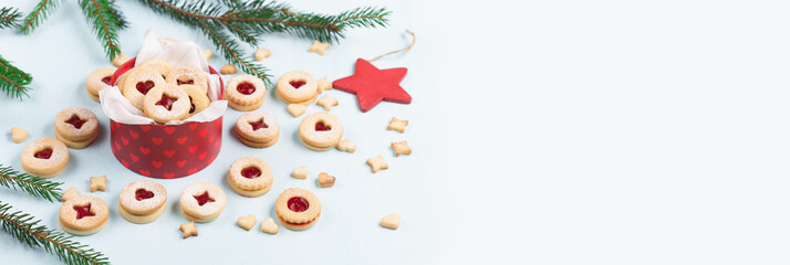 Fototapeta na wymiar Austrian Linzer Christmas New Year Shortbread Cookies on Blue